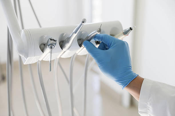 Professional Tooth Extraction technician working in Anderson, CA